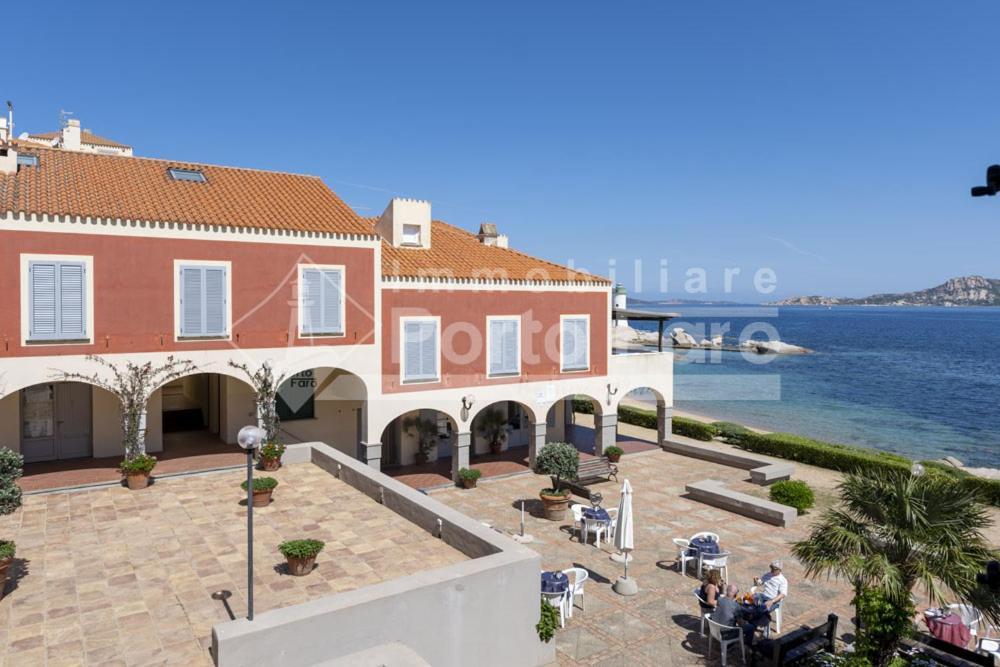 12 Centro - Trilocale Vista Mare Sul Faro Di Porto Faro Villa Palau Bagian luar foto